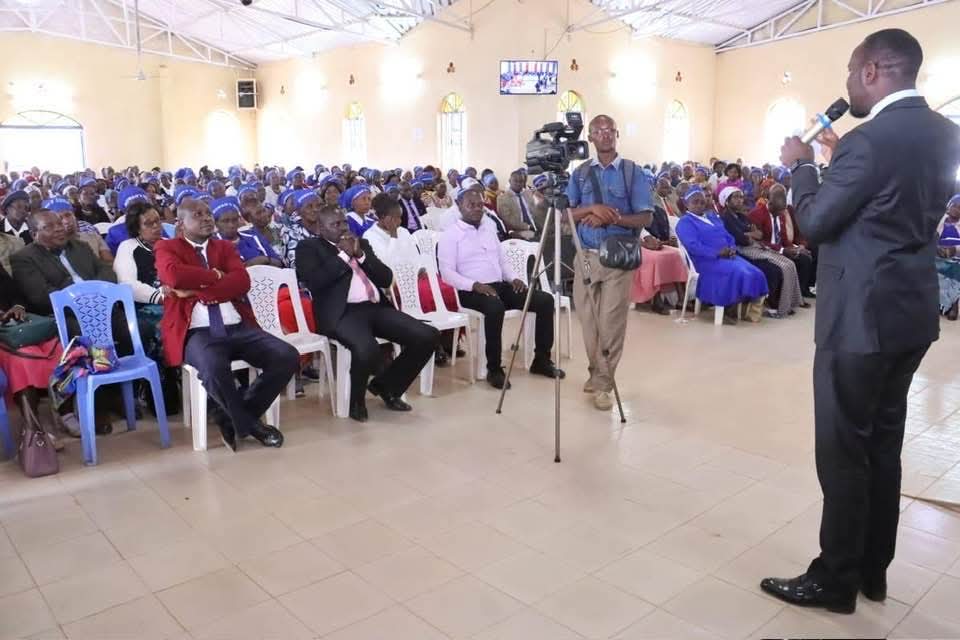 Wahome Koinange addressing a packed community event
