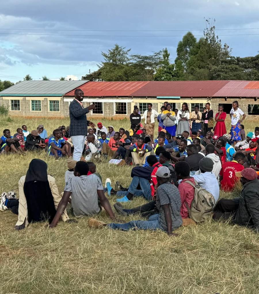 Wahome Koinange addressing young people at a community meeting